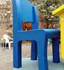 Oversized blue cardboard chair